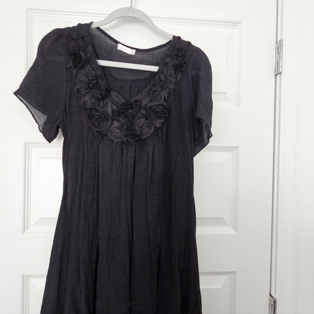 Elegant Black Dress with Floral Accents